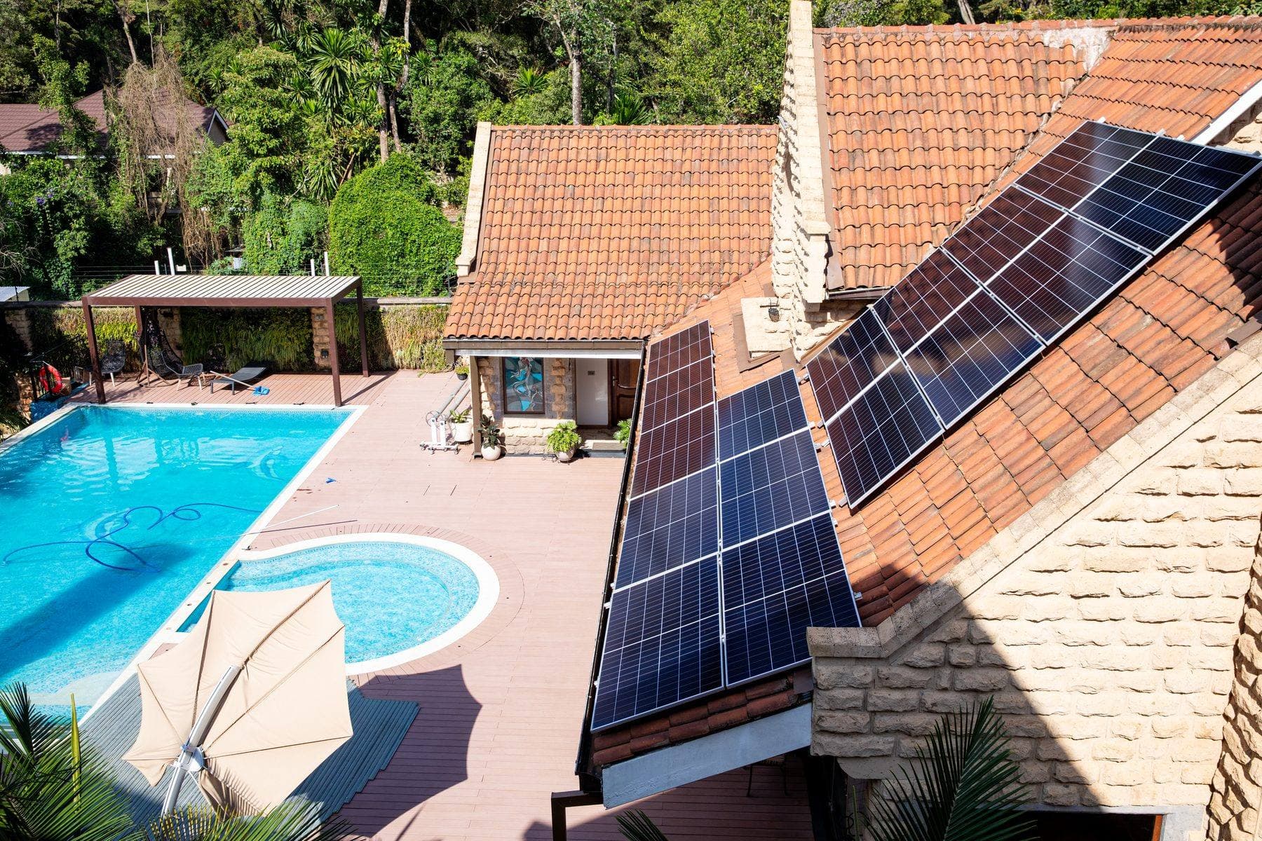 Rooftop solar panel installation on a residential home in Nairobi by Tesni Energies